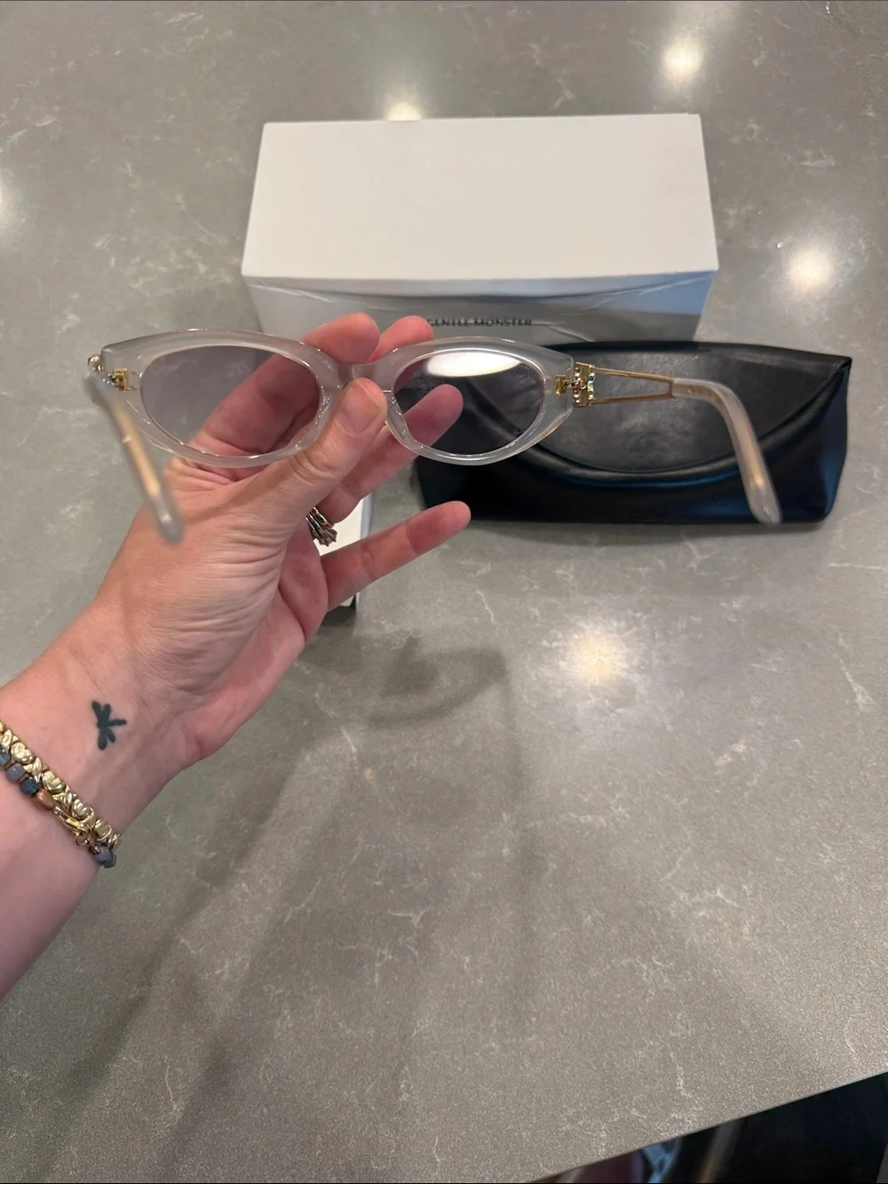 GENTLE MONSTER Clear Frame Sunglasses with Brown Lenses and Black Case